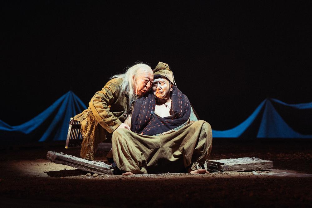 Ni Dahong: Death brushes past her 92 year old mother's jacket. 2019 | Stage | Passing by