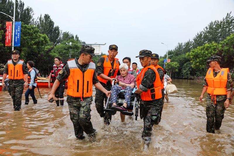 Mission Must Be Reached - The People's Liberation Army and the People's Armed Police Force Strive for Flood Control and Disaster Relief, Putting the People First Military Brigade | Officers and Soldiers | The People's Liberation Army