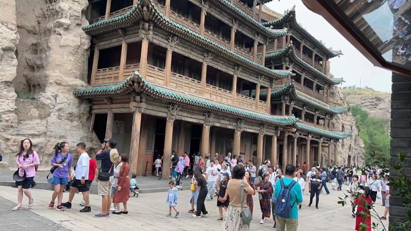 Summer tourism heats up China's "summer economy" tourists | scenic spots | economy